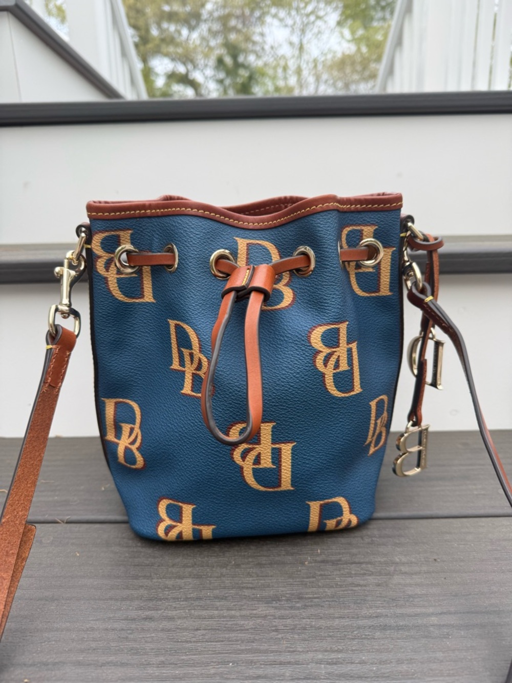Dooney & Bourke Gretta Small Drawstring Crossbody Bag in excellent condition